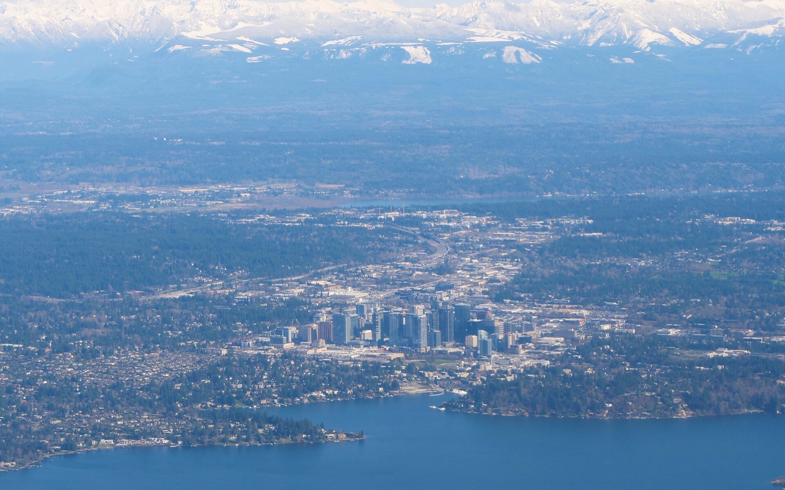 Aerial view of the downtown Bellevue, Washington skyline, with Lake Washington beyond